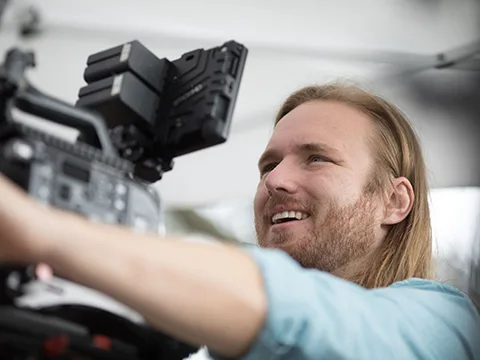 Marshall Head on location behind a cinema camera